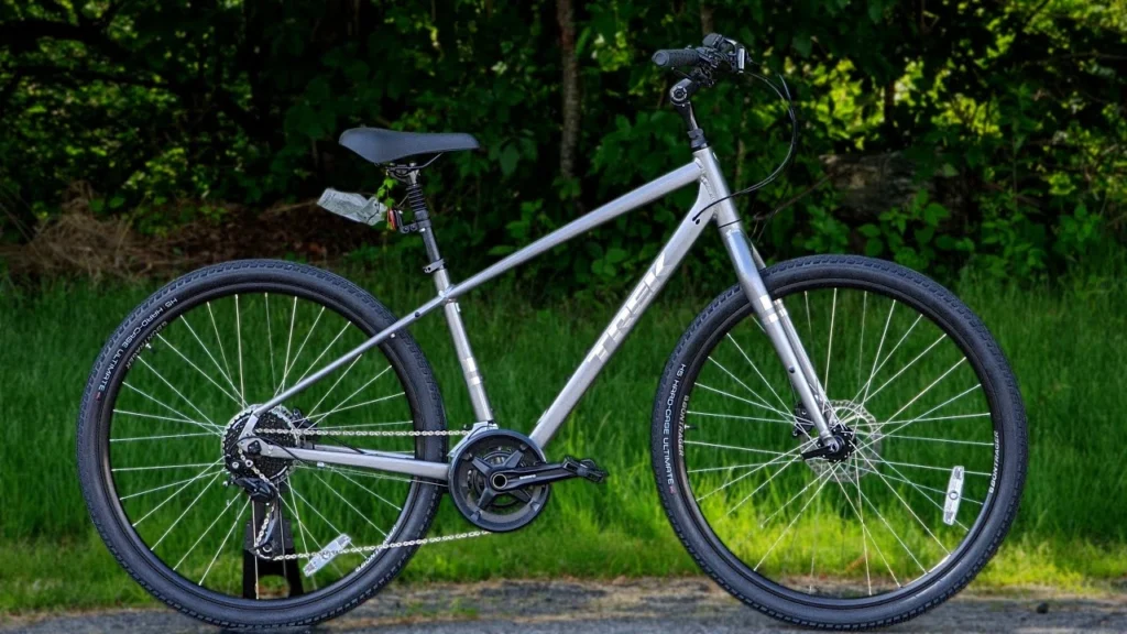 Hybrid rental bike parked at trailhead near Oro Valley